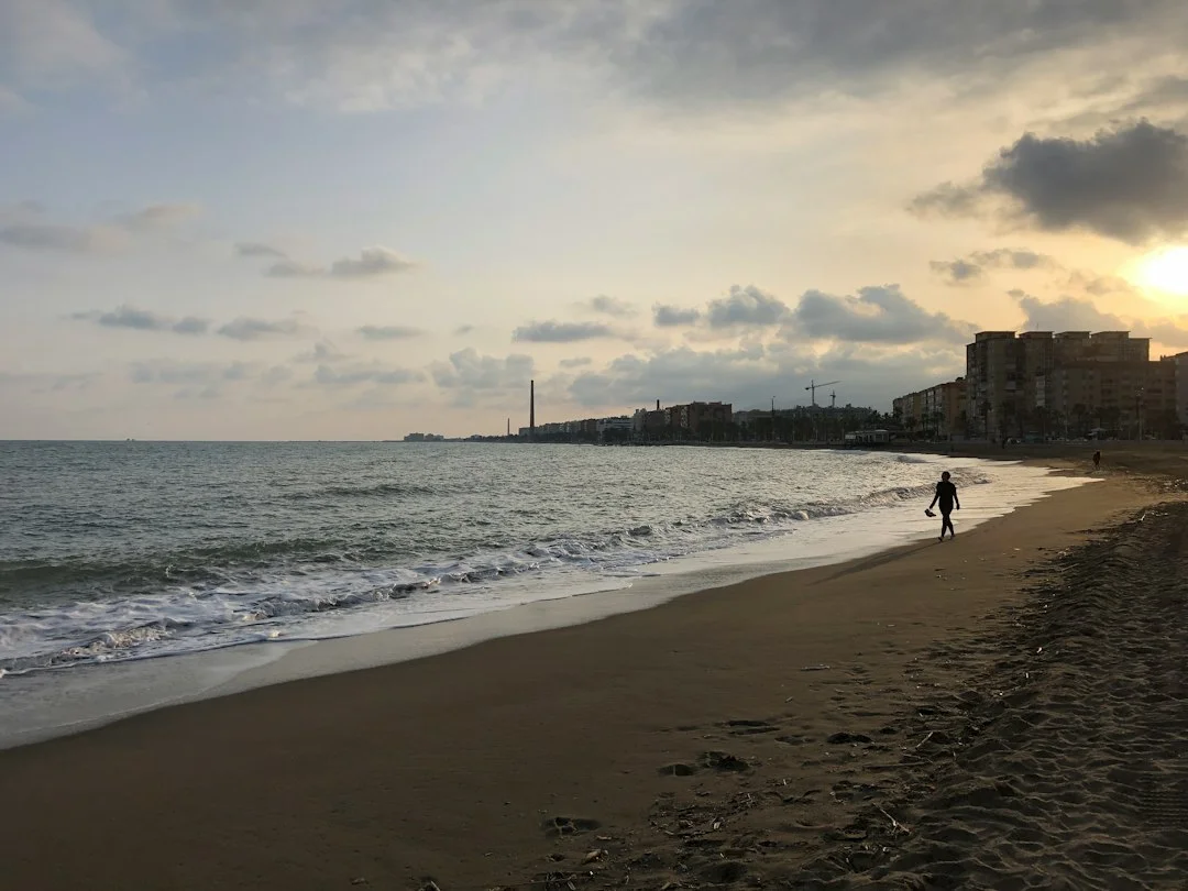 Malaga beach autumn sun weather