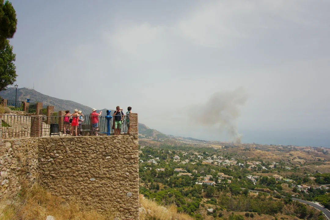 firefighters responding to forest fire in Southern Spain